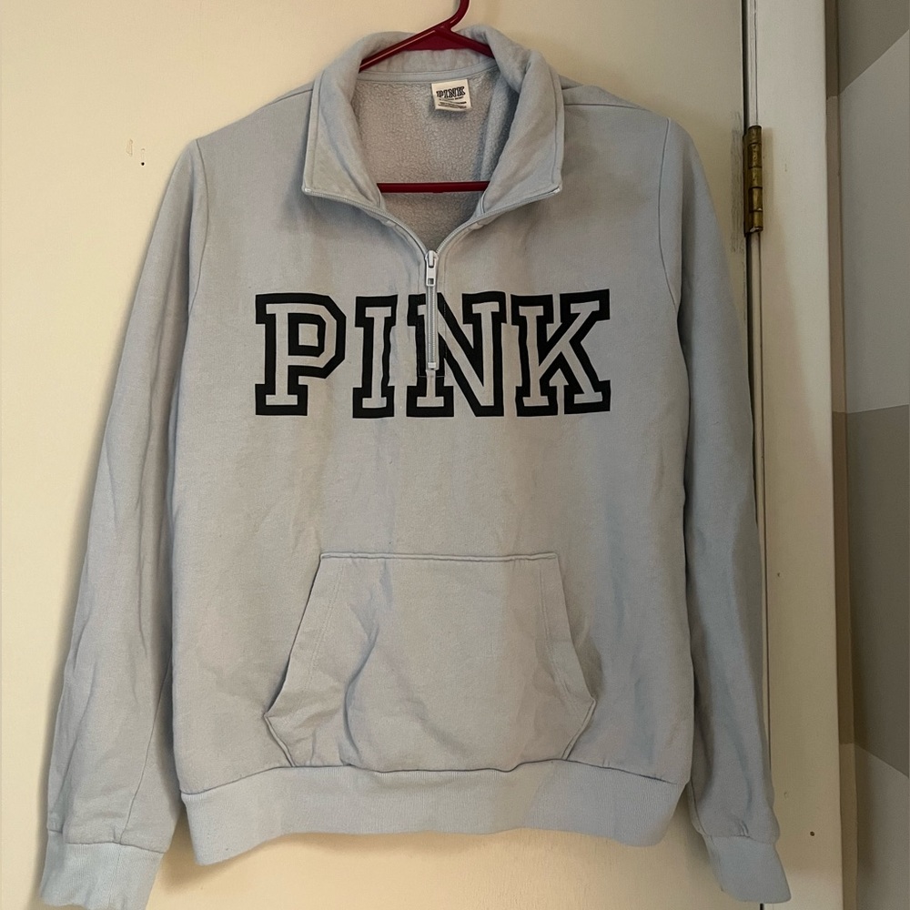 Pink quarter-zip sweatshirt